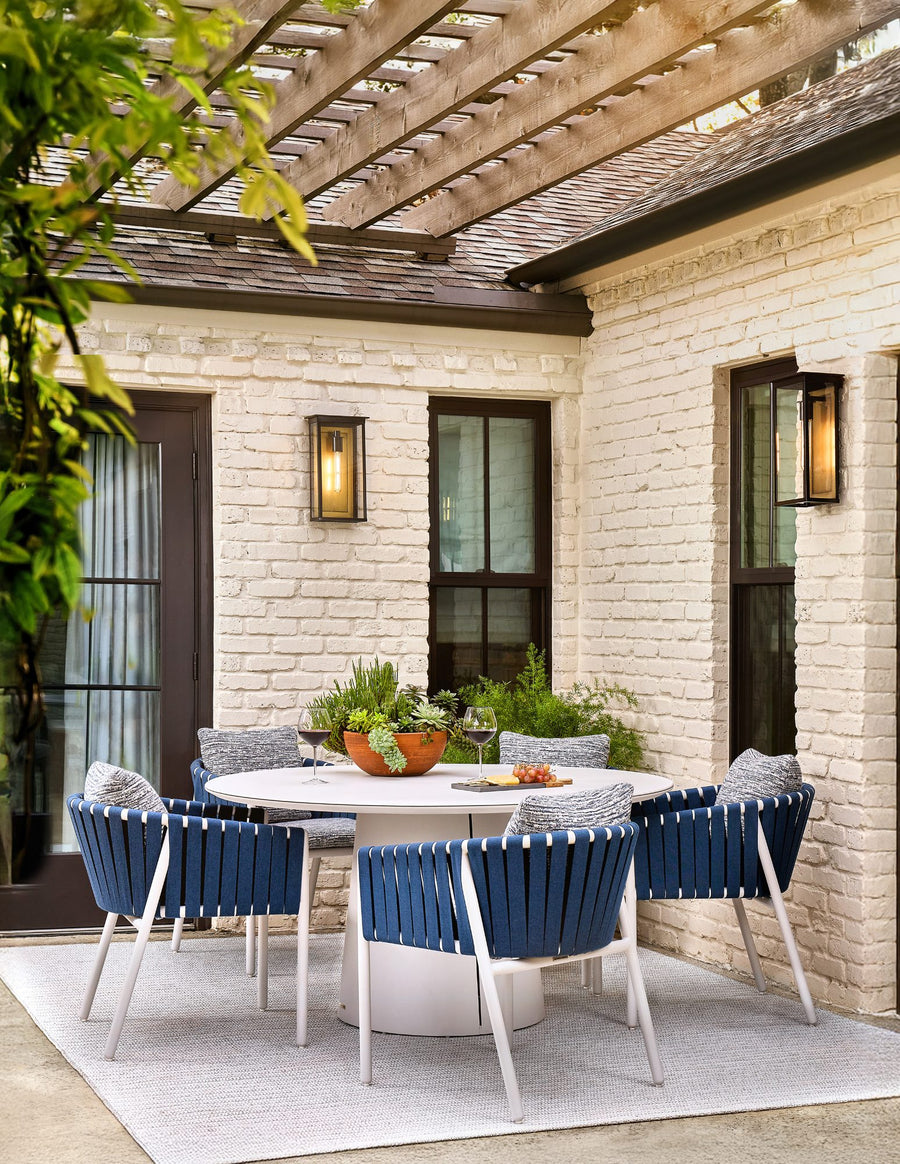 Brown Jordan Oscar II dining under a pergola