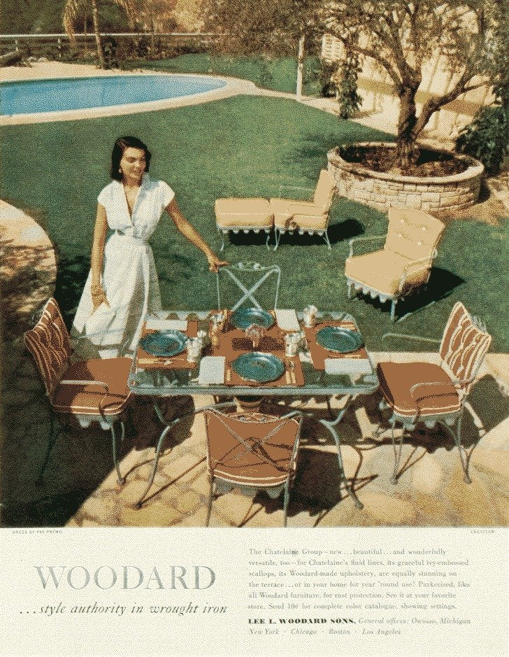 Dinner by the pool in Woodard wrought iron