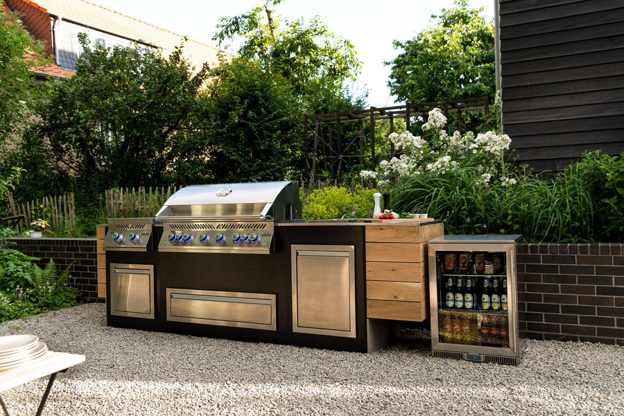Napoleon Built-In 700 Series grill in a garden outdoor kitchen island