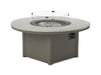 Telescope Casual round MGP slat top fire table shown with the optional 26 inch round tempered glass surround
