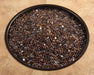 OW Lee Amber Gem fire media in a fire pit burner