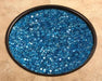 OW Lee Aruba Gem fire media in a fire pit burner