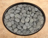 OW Lee Tumbled Lava Stone fire media in a fire pit burner