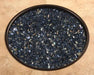 OW Lee Black Mirrored fire media in a fire pit burner