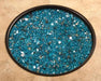 OW Lee Pacific Mirrored fire media in a fire pit burner