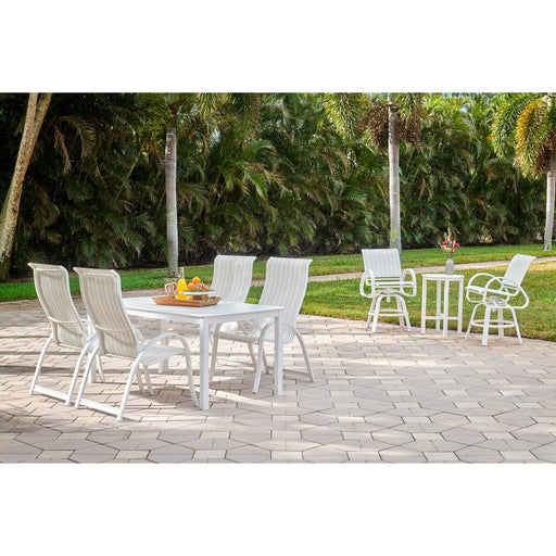 Telescope Casual Aruba II sling dining set on a garden patio