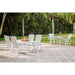 Telescope Casual Aruba II sling dining set on a garden patio