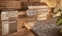 Dual infrared burner beside a Built-In 700 Series grill in a stone outdoor kitchen