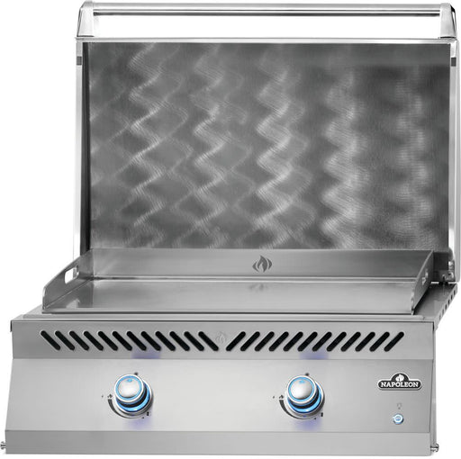 Napoleon Built-In 700 Series 32 inch griddle with the lid open, angled view