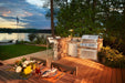 Built-In 700 Series 32 in a lakeside outdoor kitchen at sunset