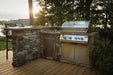 Built-In 700 Series 32 in a stone outdoor kitchen on a deck
