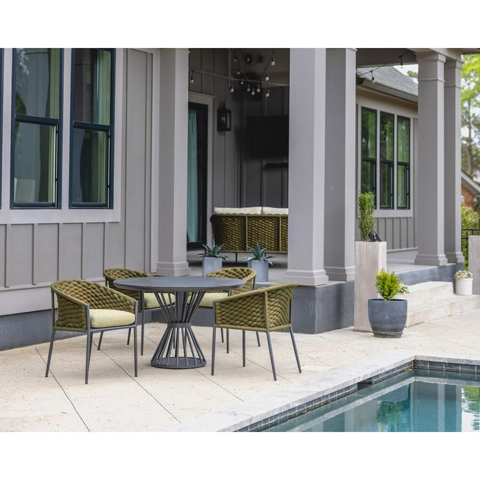 Lloyd Flanders Escape dining set on a patio