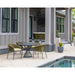 Lloyd Flanders Escape dining set on a patio