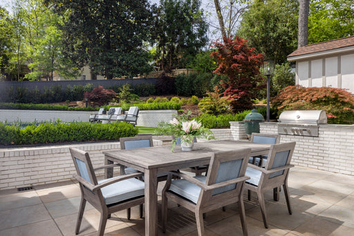 Lloyd Flanders Frontier dining set on a patio