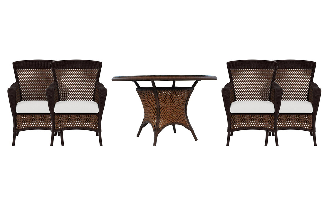 Lloyd Flanders Grand Traverse dining set on a patio, with each included piece