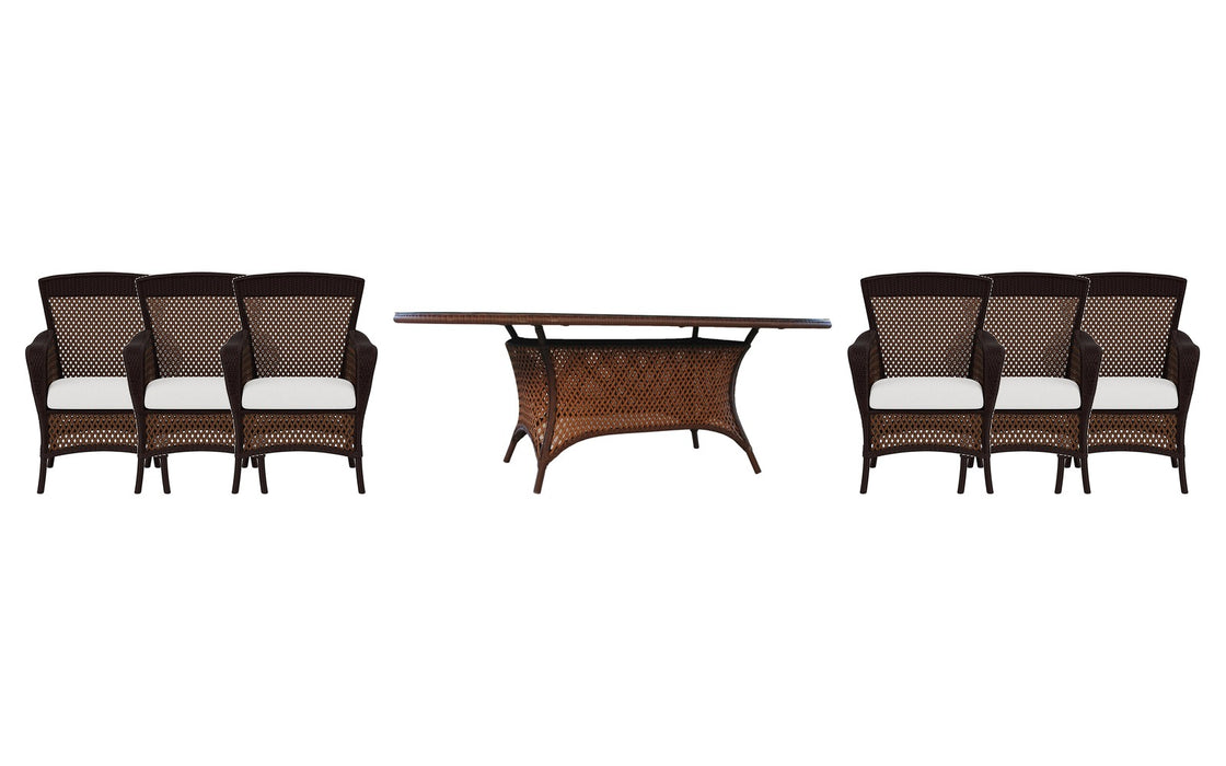 Lloyd Flanders Grand Traverse dining set on a patio, with each included piece