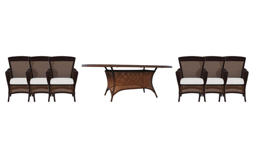 Lloyd Flanders Grand Traverse dining set on a patio, with each included piece
