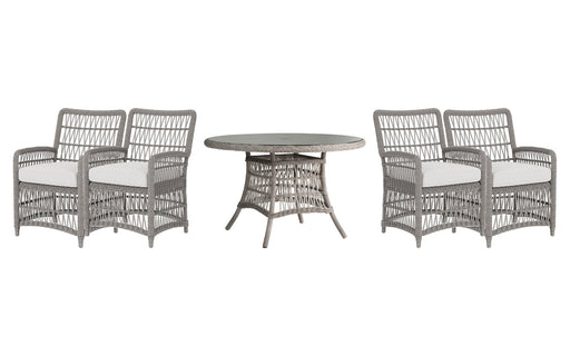 Lloyd Flanders Mackinac dining set on a patio, with each included piece