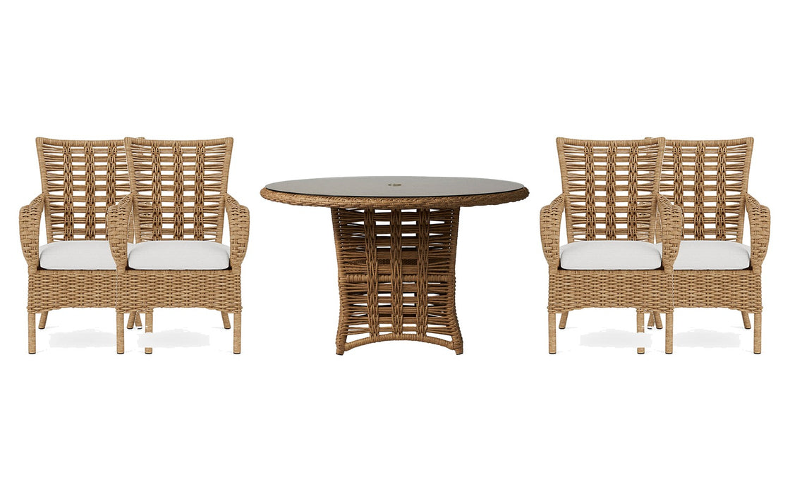 Lloyd Flanders Magnolia dining set on a patio, with each included piece