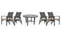 OW Lee Arc dining set on a patio, with each included piece