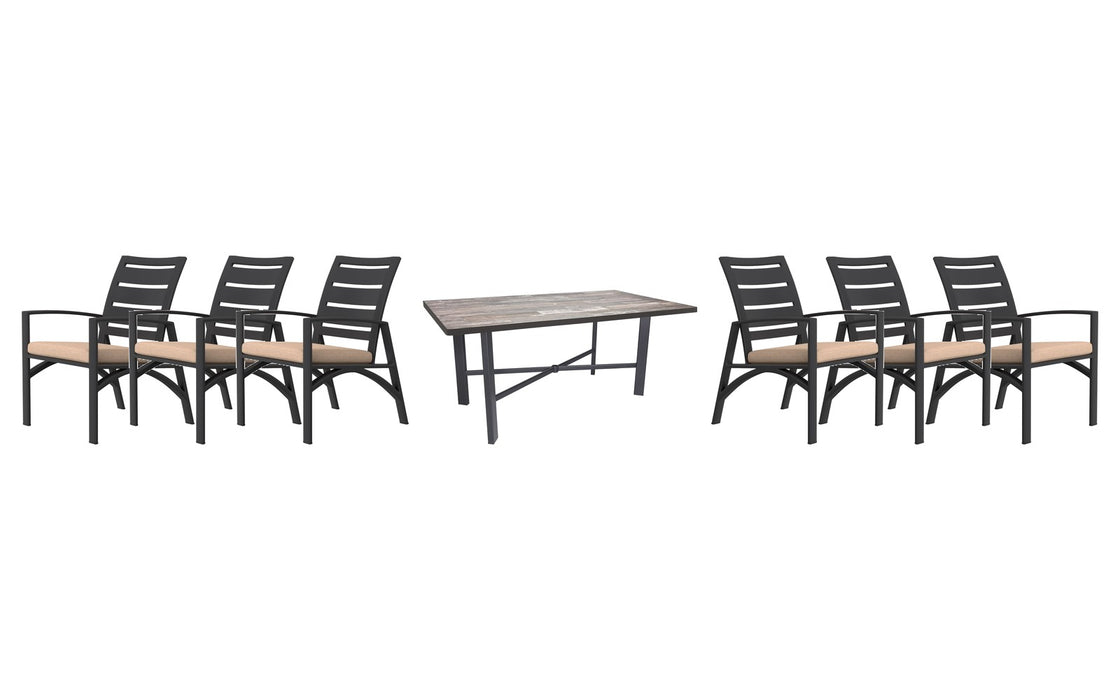 OW Lee Arc dining set on a patio, with each included piece