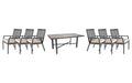 OW Lee Aris dining set on a patio, with each included piece