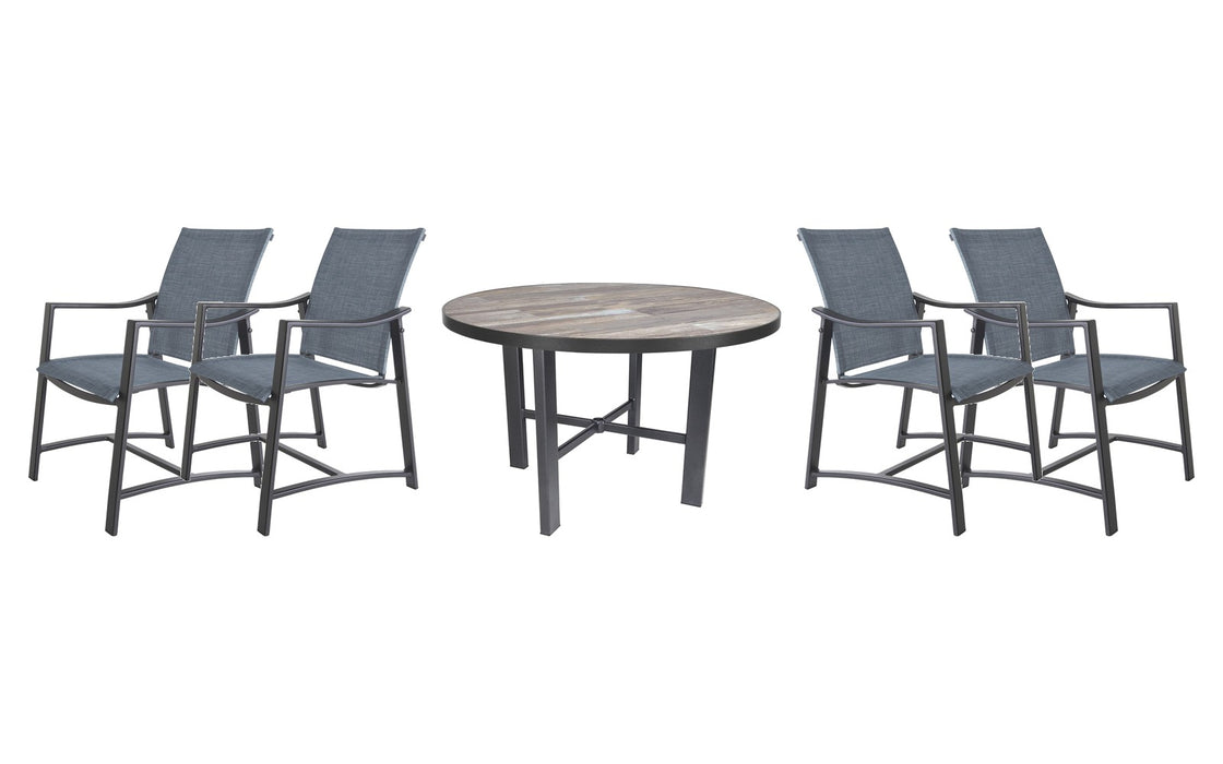 OW Lee Avana dining set on a patio, with each included piece