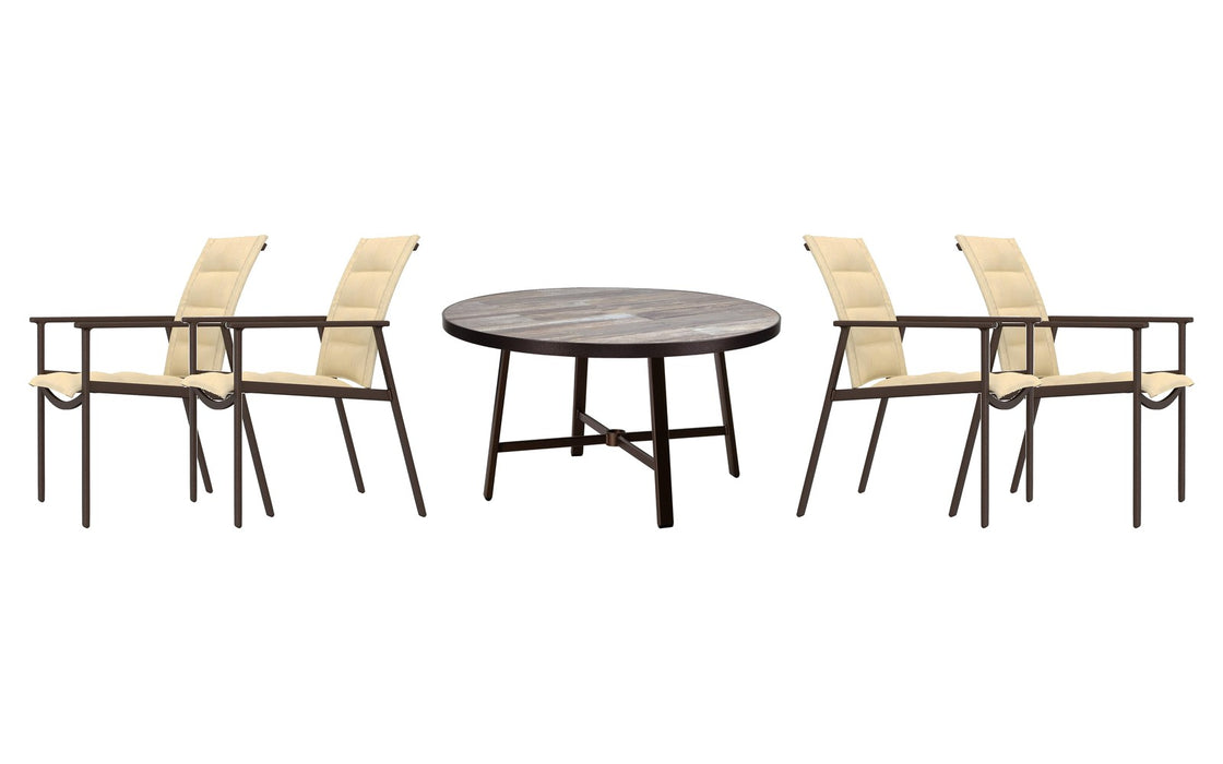 OW Lee Marin dining set on a patio, with each included piece