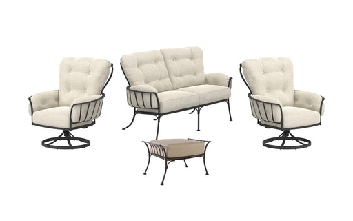 OW Lee Monterra Urban Scale 4-Piece Lounge Set with Swivel Rockers on a patio
