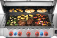 Steaks, vegetables and flatbreads cooking on the Prestige 665 Connected