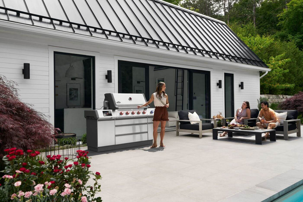Prestige PRO 665 Elite on a patio beside a modern home