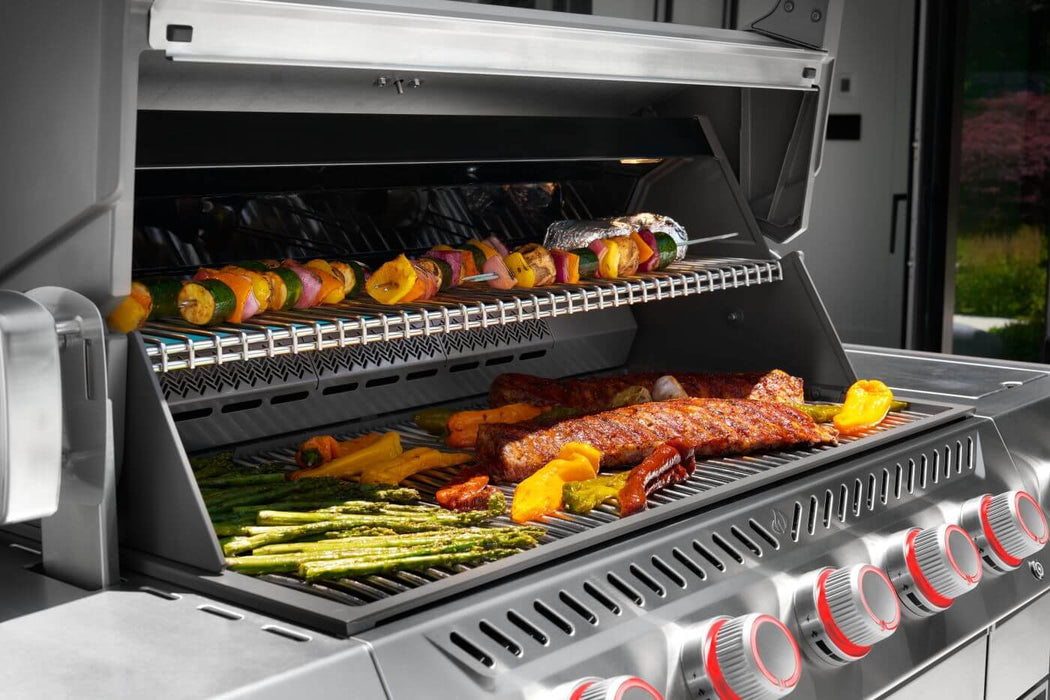 Ribs, sausages and vegetables cooking on the Prestige PRO 665 Elite