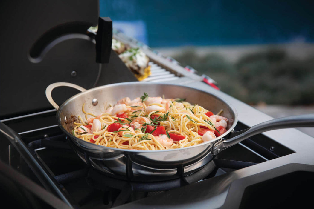Shrimp pasta cooking on the power side burner