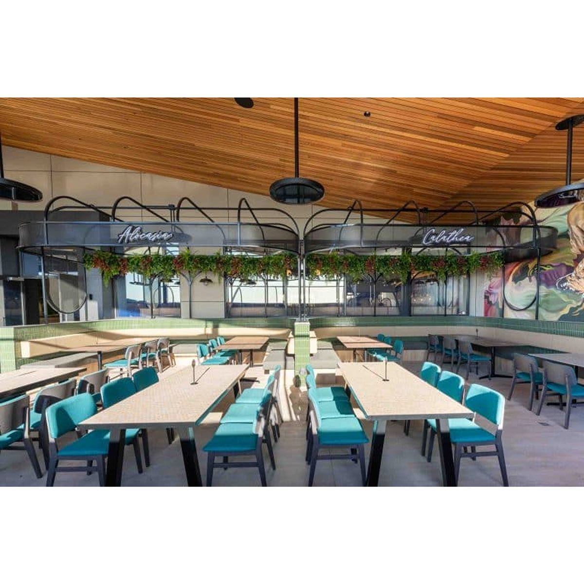 Hotel restaurant terrace with overhead Bromic heaters and dining tables