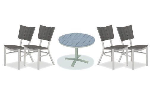Telescope Casual Avant dining set on a patio, with each included piece