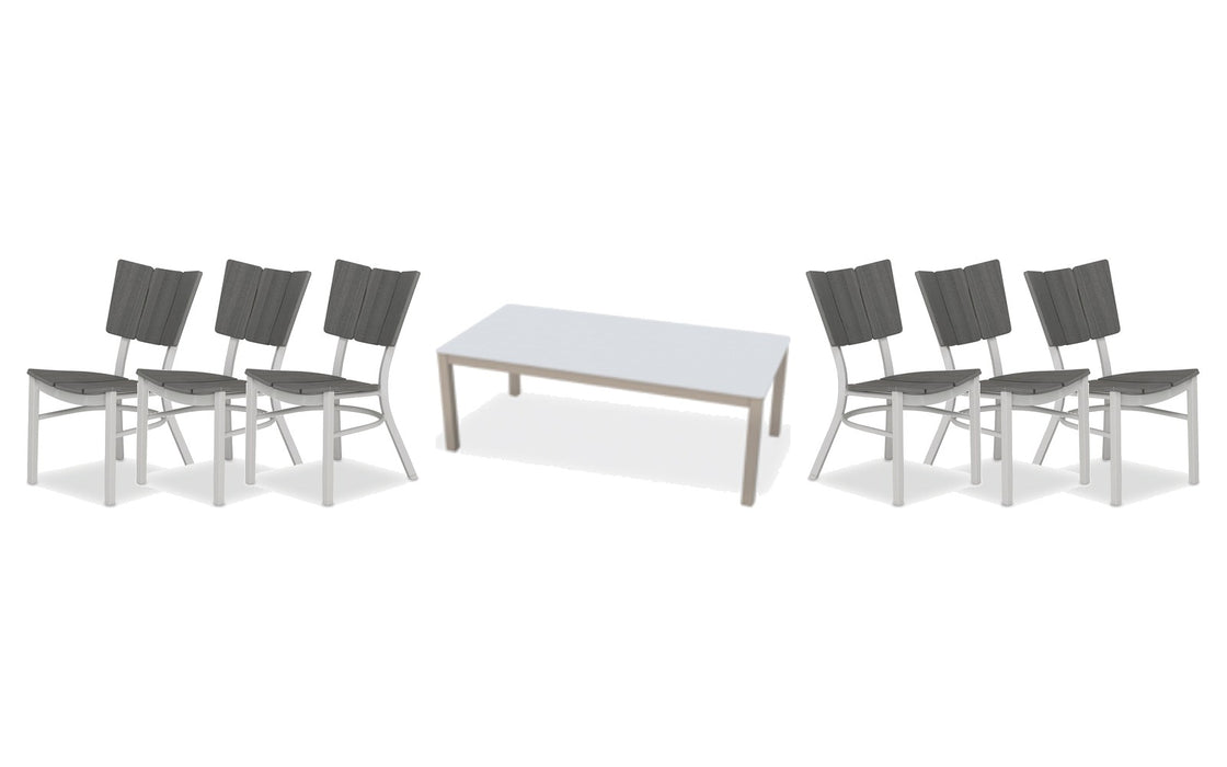 Telescope Casual Avant dining set on a patio, with each included piece