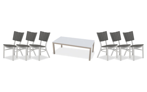 Telescope Casual Avant dining set on a patio, with each included piece