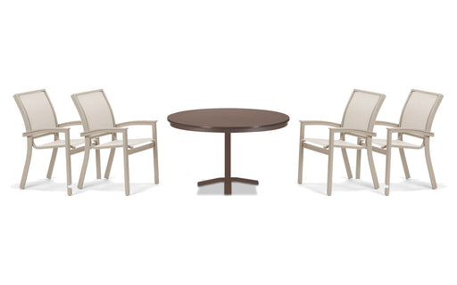 Telescope Casual Bazza dining set on a patio, with each included piece