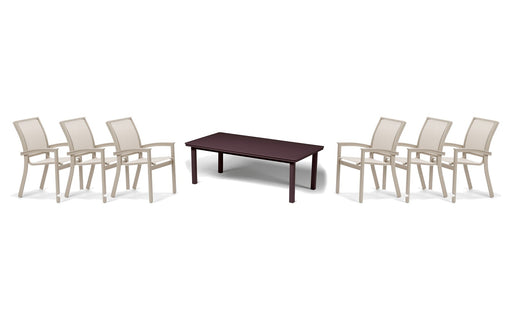 Telescope Casual Bazza dining set on a patio, with each included piece