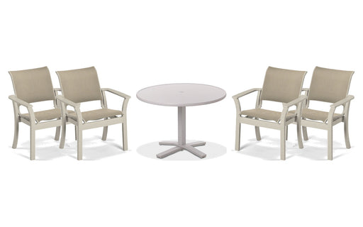 Telescope Casual Dune dining set on a patio, with each included piece