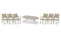 Telescope Casual Dune dining set on a patio, with each included piece