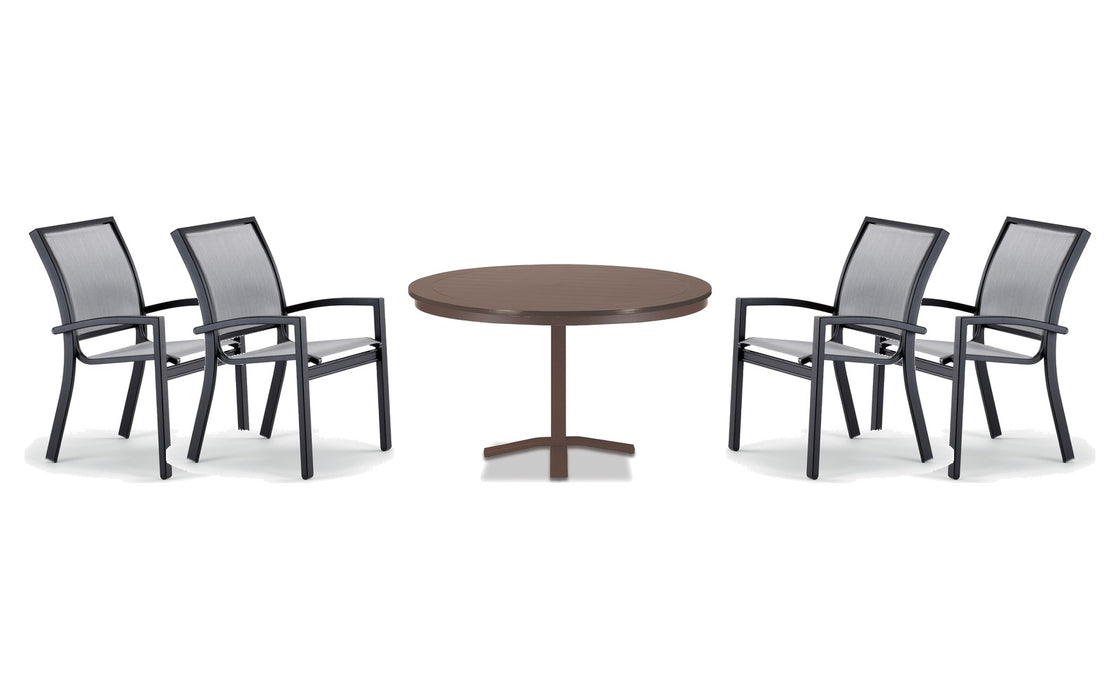 Telescope Casual Kendall dining set on a patio, with each included piece