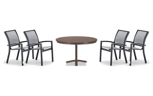 Telescope Casual Kendall dining set on a patio, with each included piece
