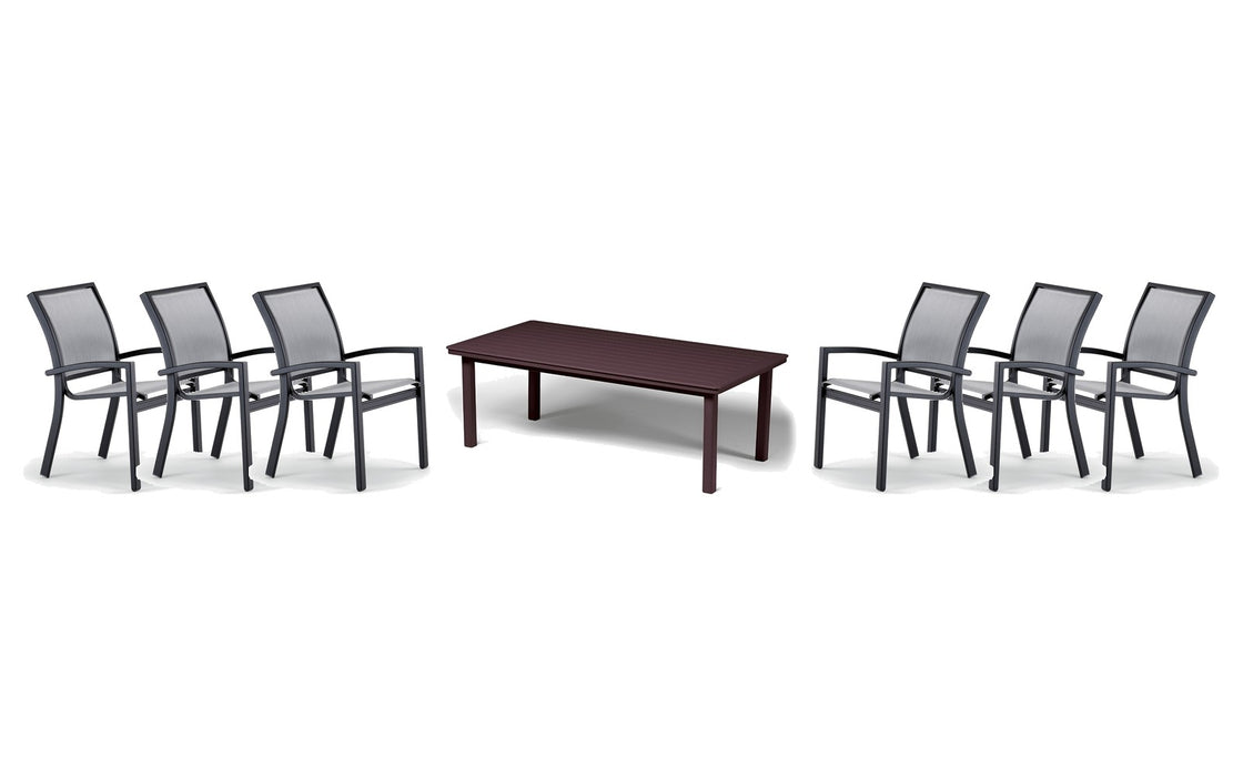 Telescope Casual Kendall dining set on a patio, with each included piece