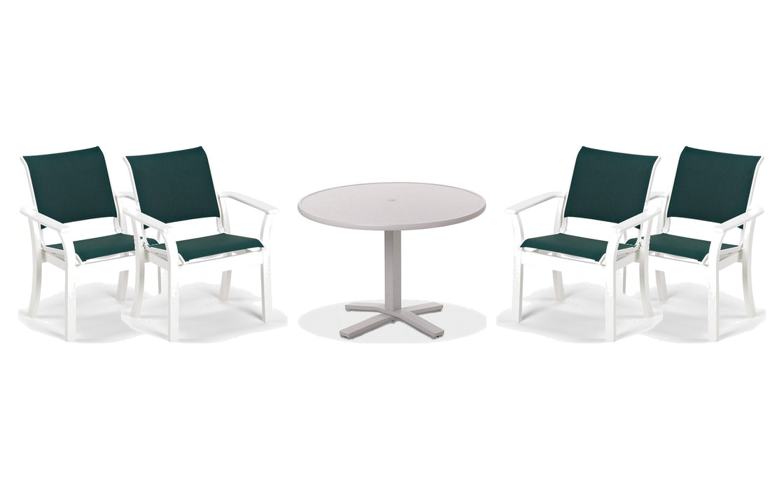 Telescope Casual Leeward dining set on a patio, with each included piece