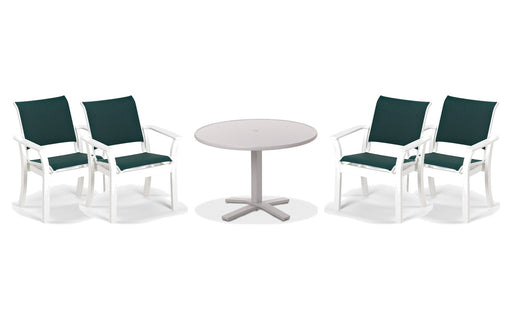 Telescope Casual Leeward dining set on a patio, with each included piece