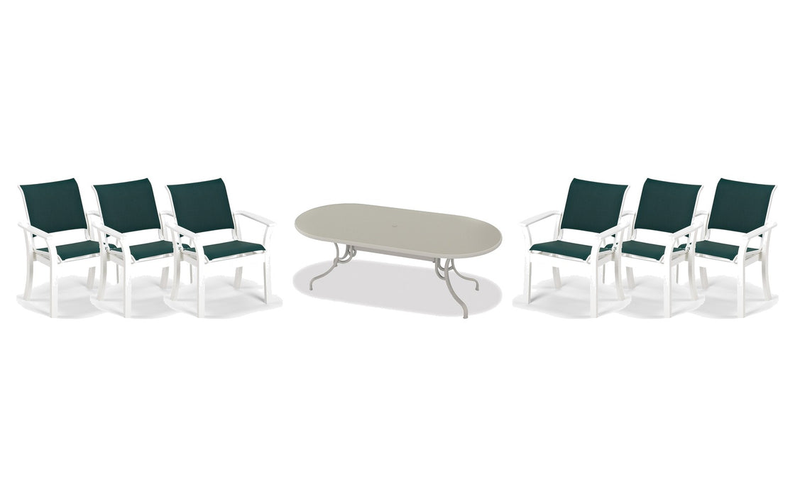 Telescope Casual Leeward dining set on a patio, with each included piece