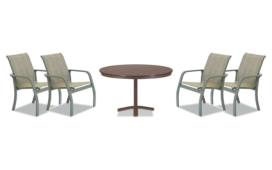 Telescope Casual Soho dining set on a patio, with each included piece
