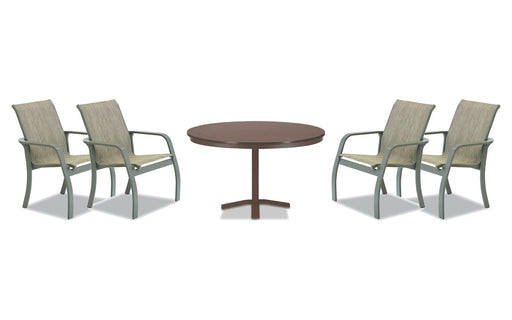 Telescope Casual Soho dining set on a patio, with each included piece