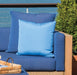 Lloyd Flanders throw pillows in two blues on Catalina seating